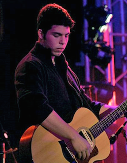 Ryan playing the guitar