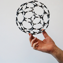 Jan Cami Holding Buckyball Model