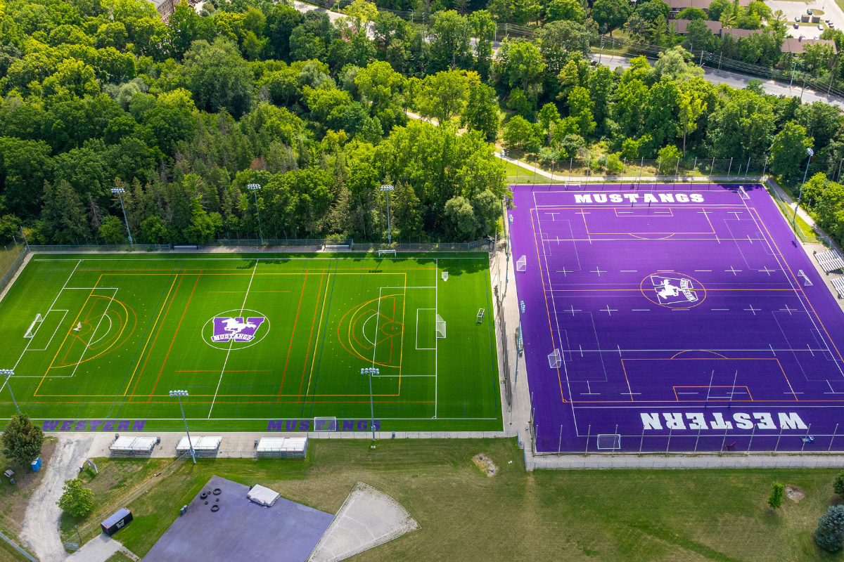 Two large soccer fields, marked with Western Mustangs' logos.