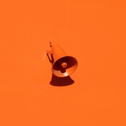 megaphone on orange background