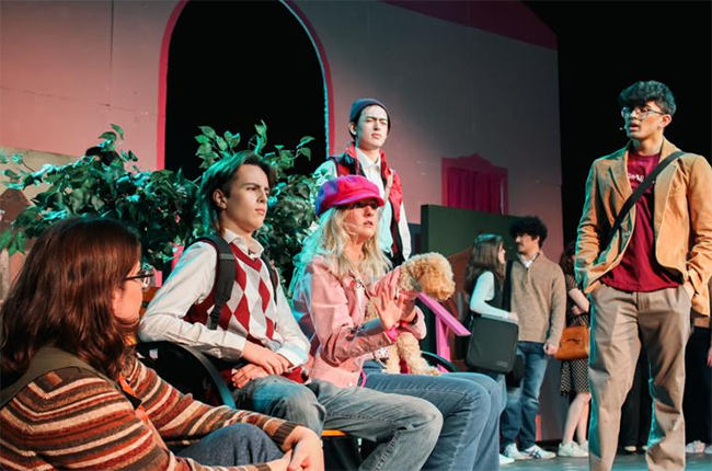 A still from a Western Theatre production of Legally Blonde showing actors mid-scene