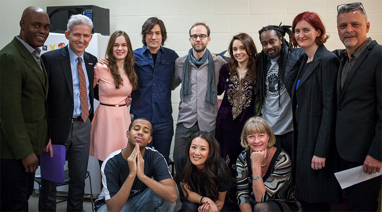A group photo of creative professionals at a big event