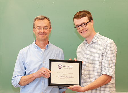 Dr. Jim Staples presenting the 2018 TA Award to Jackson Kusack