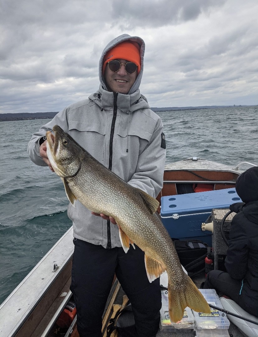 Student holding fish