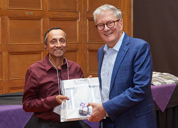 25 year service award recipient with President Alan Shepard