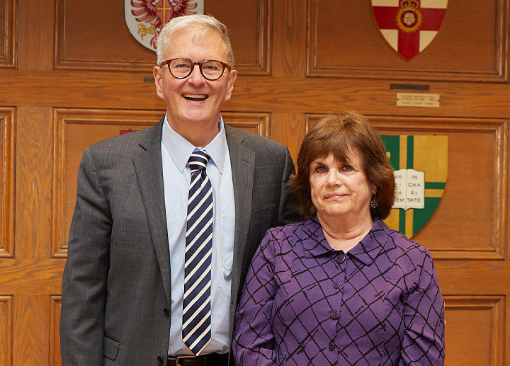 President Alan Shepard with medal winner Debbie Acton.