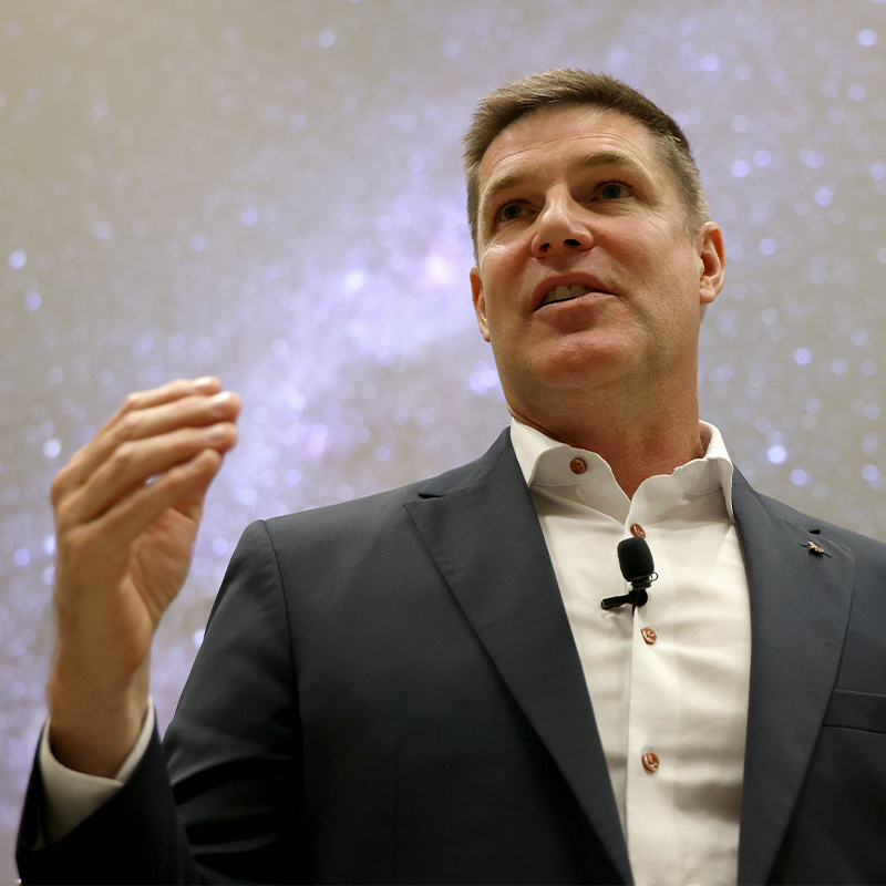 Astronaut Jeremy Hansen speaks to a crowd of Western staff.