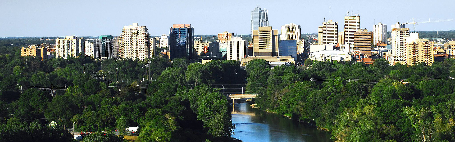 An aerial view of downtown London, Ontario with the river running down the middle.
