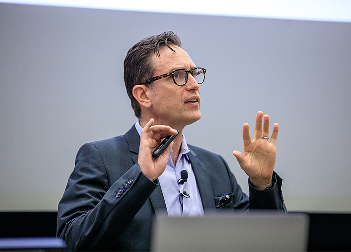 A guest speaker addresses participants in a Staff and Leader conference day.