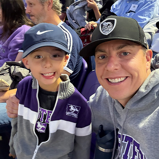 Father and son at an employee celebration day event.