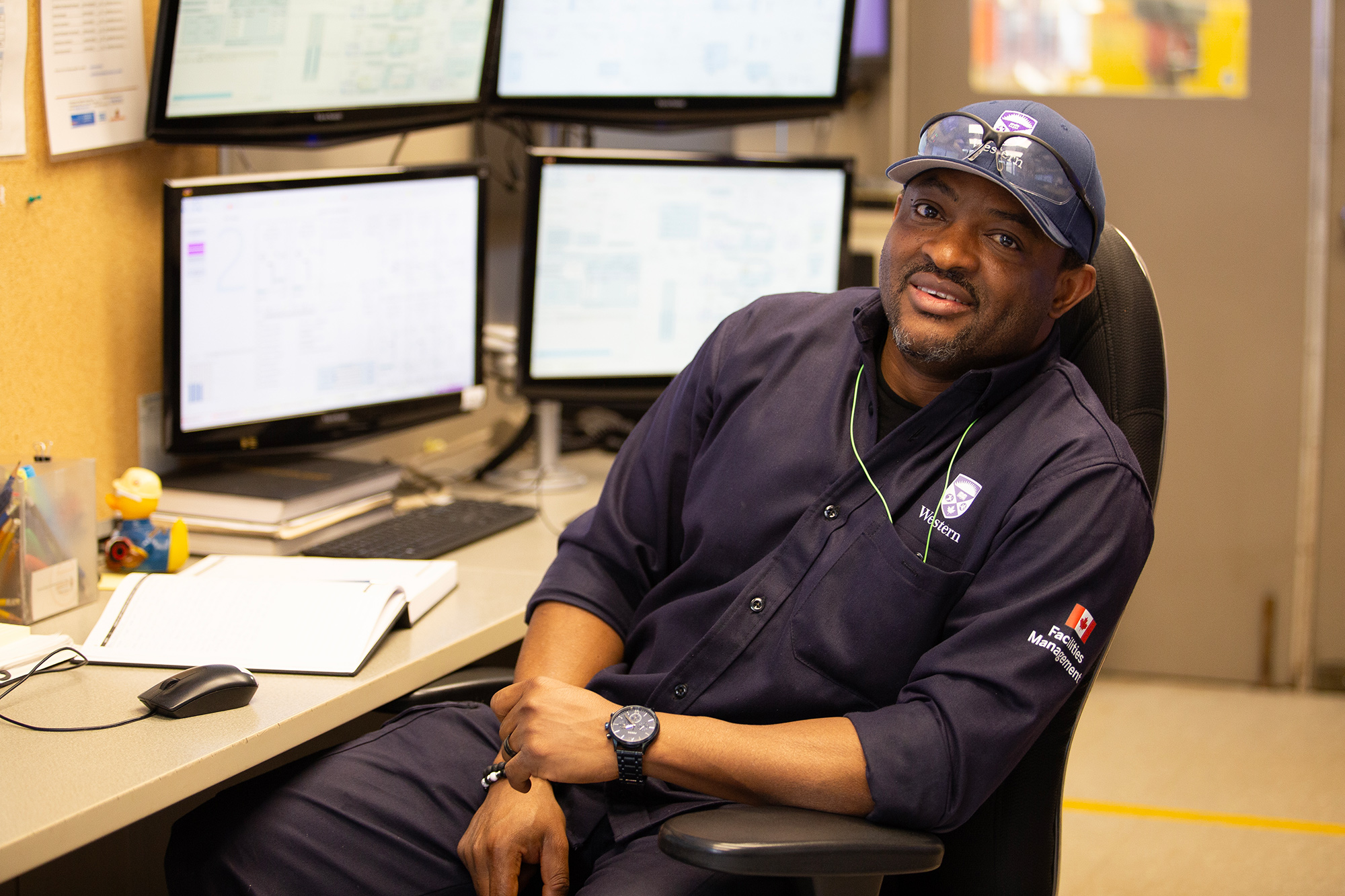Stationary Engineer, Kayo Olajide monitors controls in Western's Power Plant.