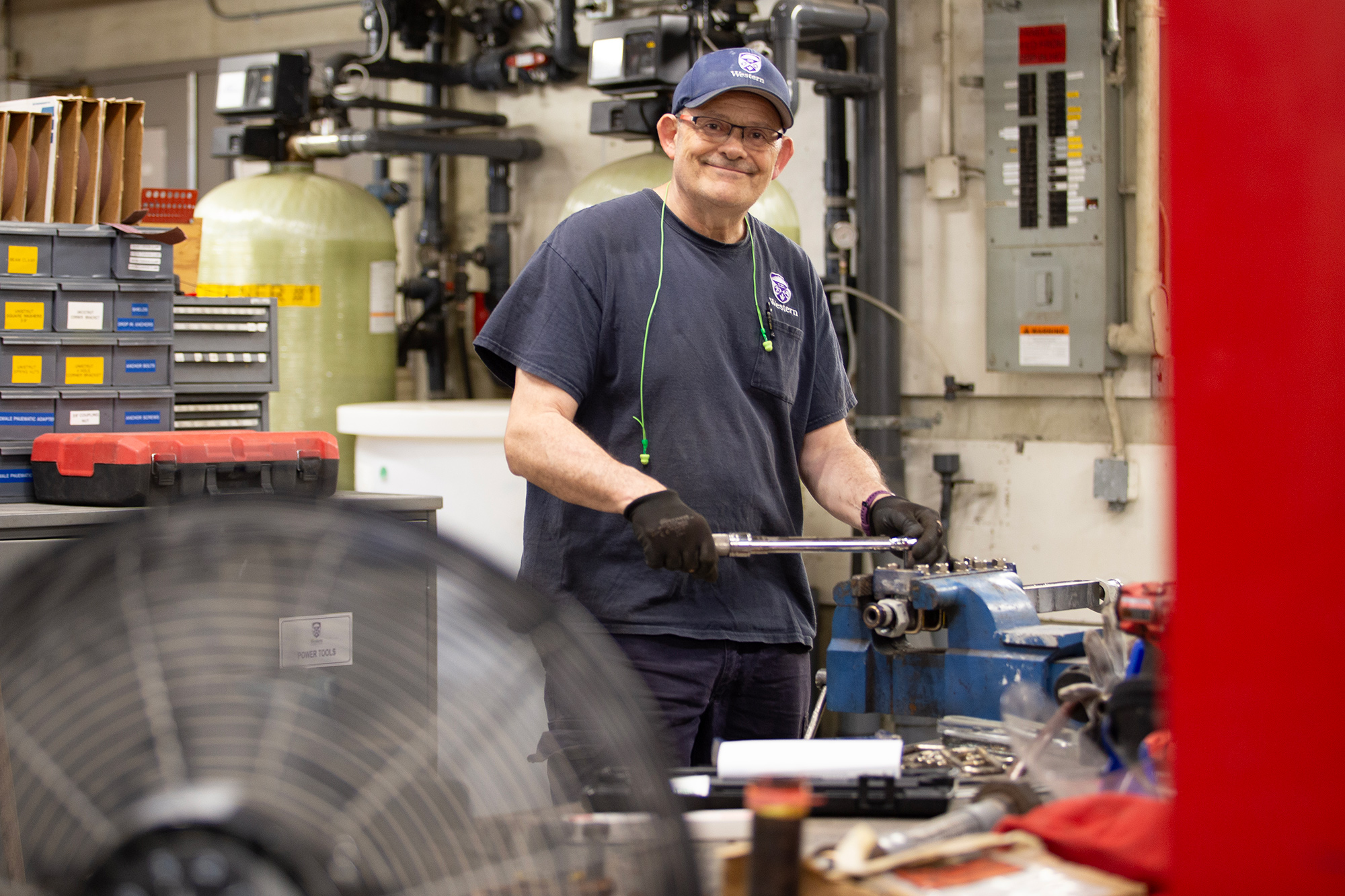 Stationary Engineer, Ken Goulet works inside Western's Power Plant.