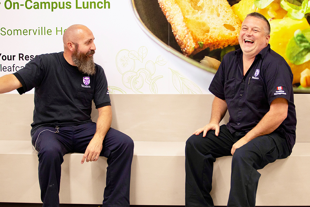 Caretakers Joe Rossi and Igor Gregorev share a laugh outside of Lucy's.