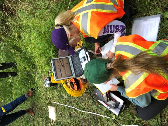 Students analyzing a shot gather image.