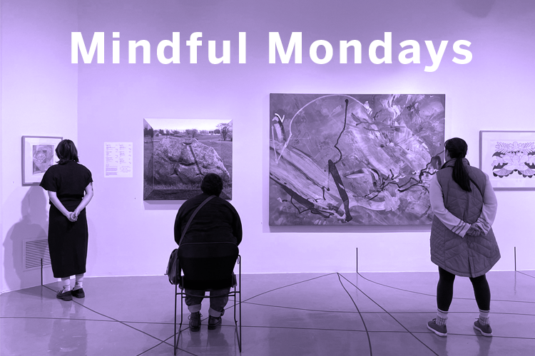 Participants look closely at artwork in 'Holding Patterns' during earlier Mindful Mondays session