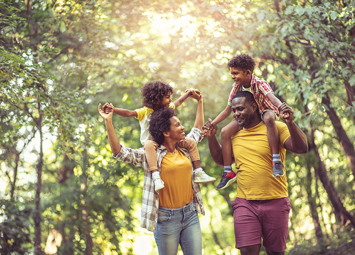 Parents walking with their child