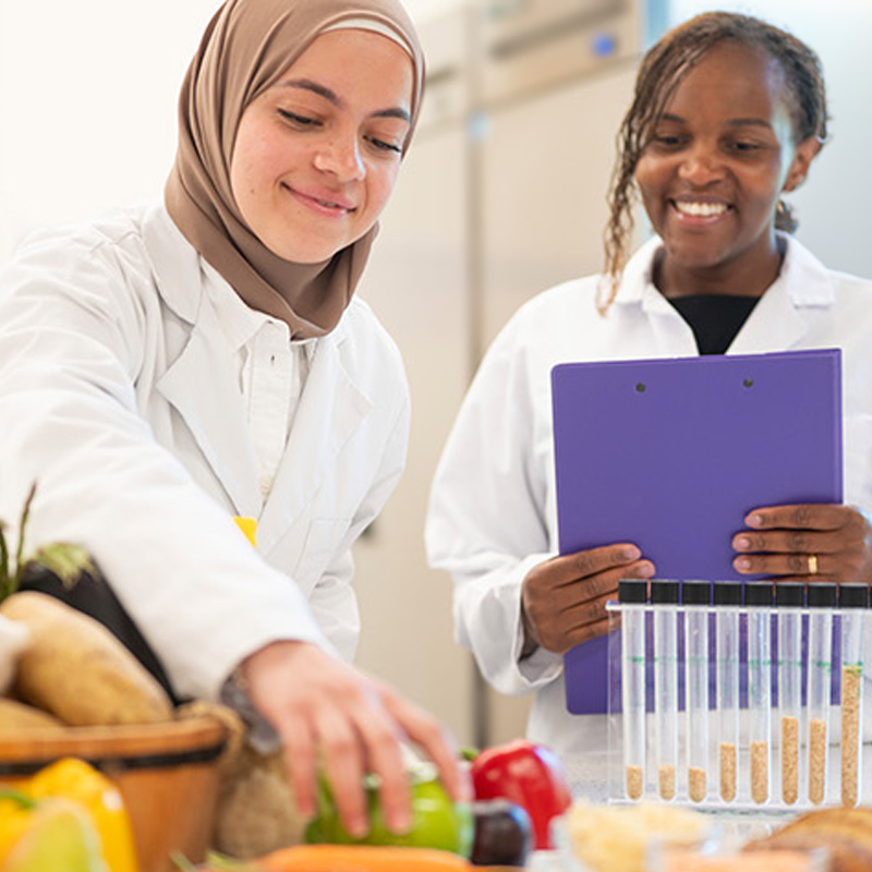 Student with mentor working in one of our facilities.