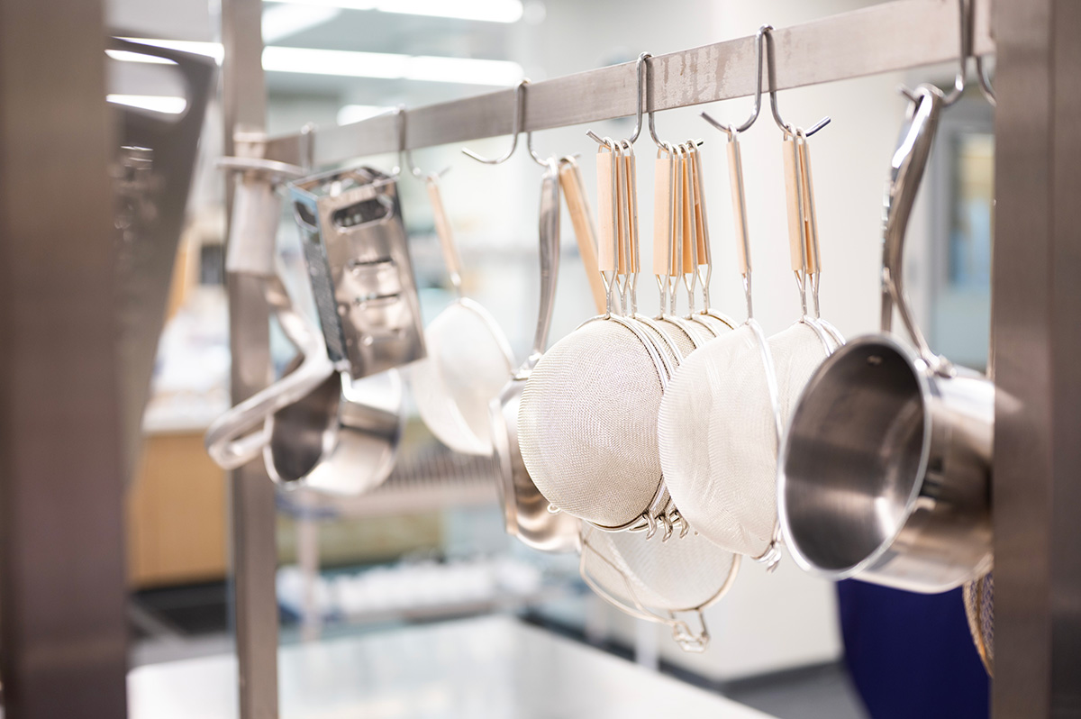 Closeup of pots and other kitchenware.