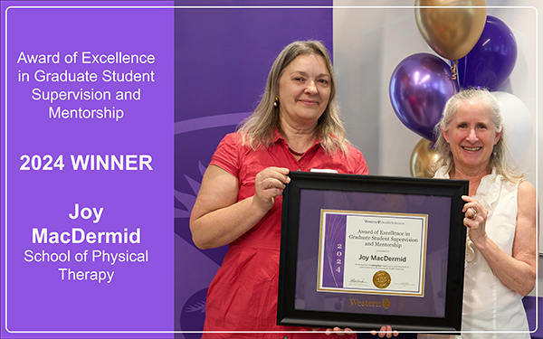 Joy MacDermid receives her award from Jayne Garland, Dean