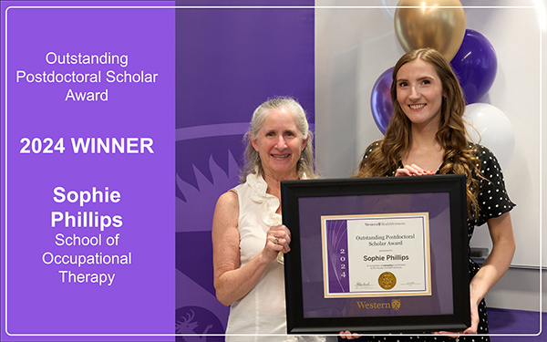 Sophie Phillips receives her award from Jayne Garland, Dean