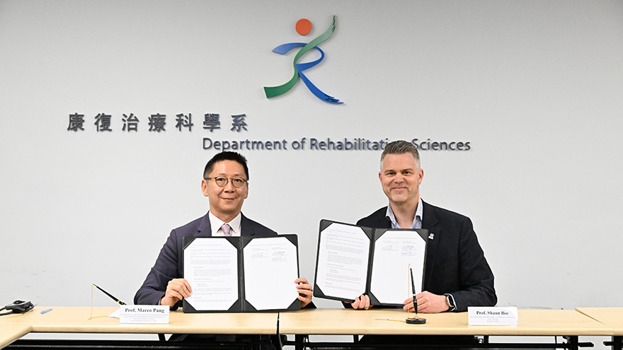 Prof. Marco Pang and Dr. Shaun Boe signing the renewed MoU