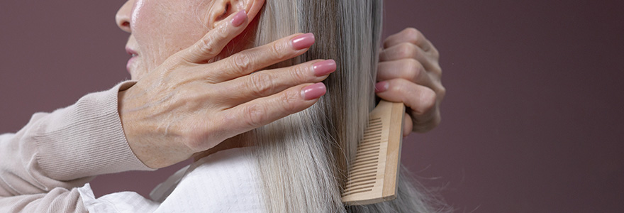 older adult brushing hair