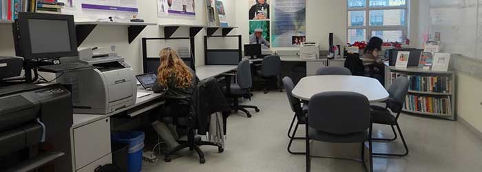 Two people sitting in a research lab