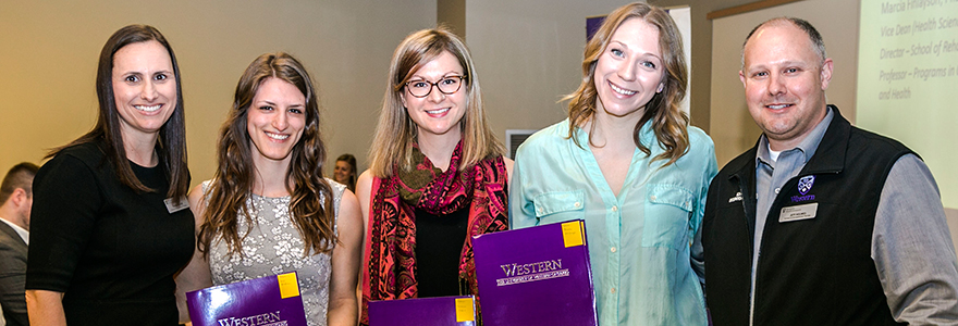 Students and faculty members at conference