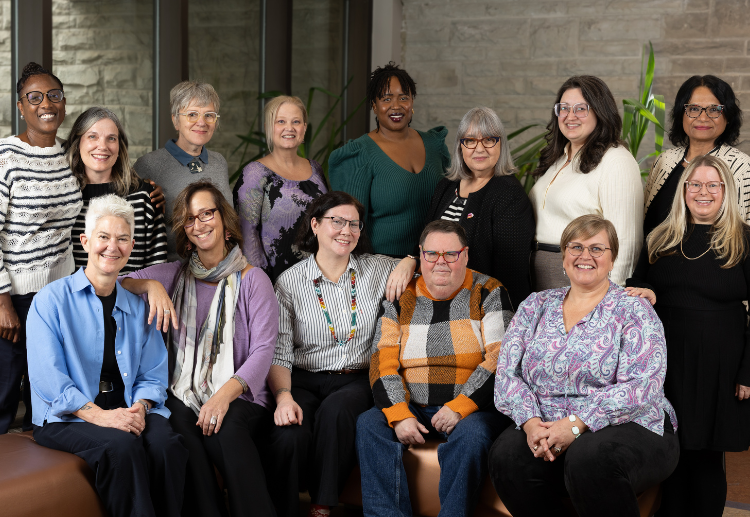 A group photo with 12 of the full-time faculty members pictures