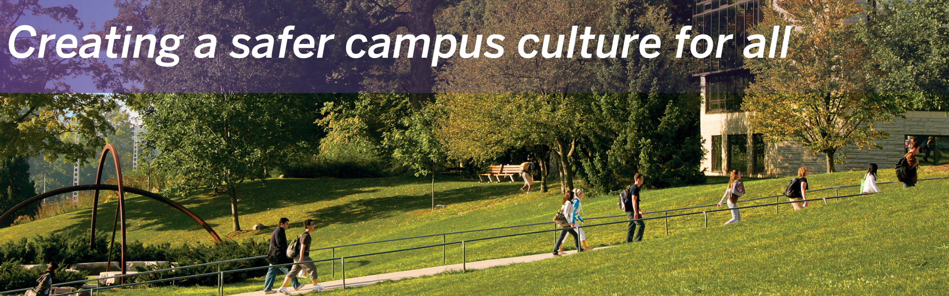 students walking on campus in the summer