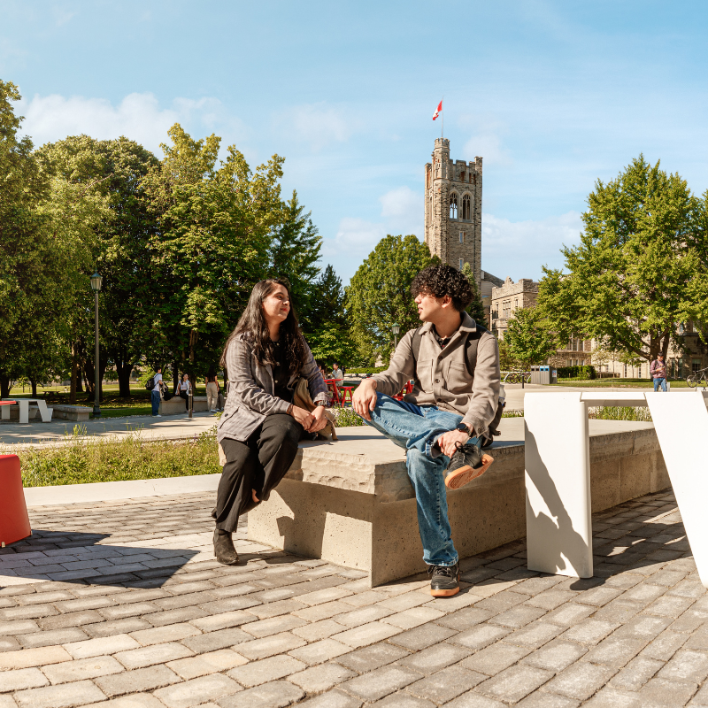Two students speaking together.