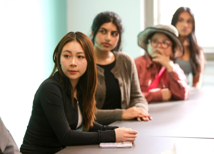 A student sitting at a table.