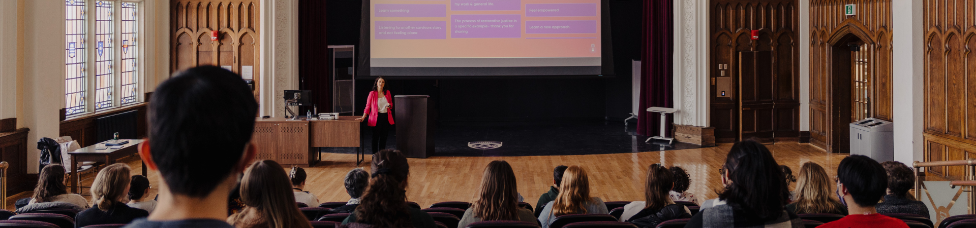 An instructor presenting to a classroom full of students.