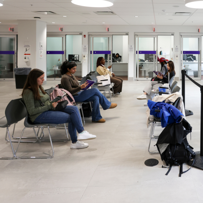 People waiting in the Thames Hall clinic.