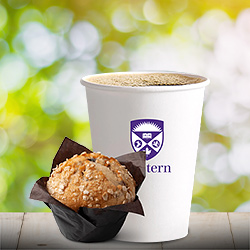 cup of coffee with a Western logo on it