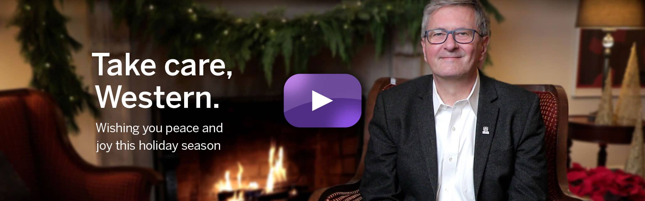 Alan Shepard's by the fireplace with dog Meisha