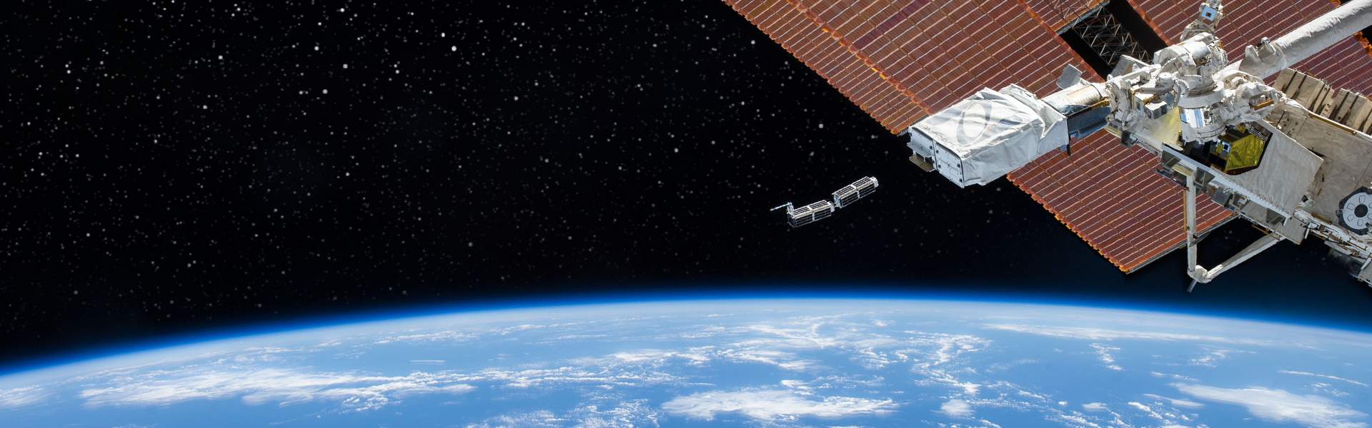 Photo of CubeSat mini-satellite in space