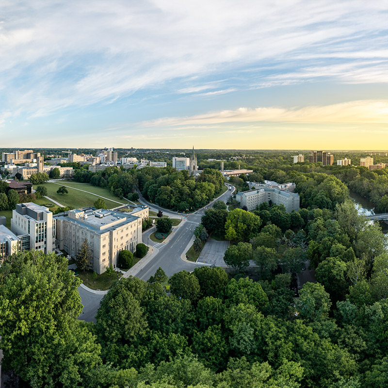 Aerial view of campus facing east showing trees, roads and Middlesex Tower