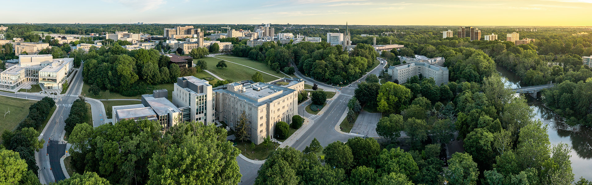 Aerial view of campus facing east showing trees, roads and Middlesex Tower