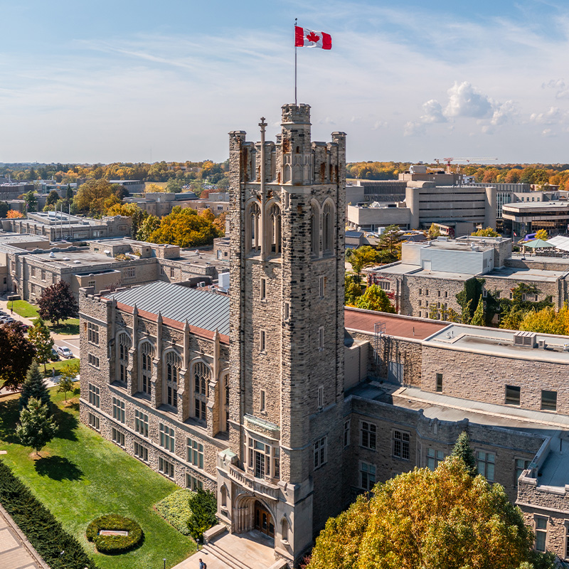 University College Tower with a Canadian flag flying from the top