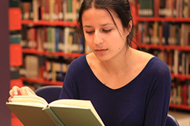 student reading a book