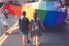 Dr. James Miller's children with the rainbow flag at the Toronto's Pride Parade.