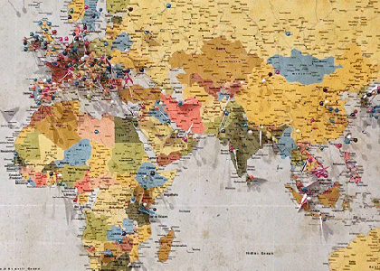 World map, with pins