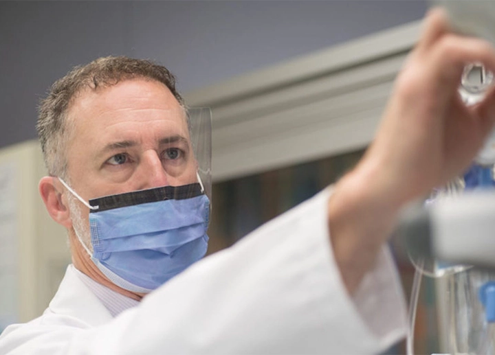 Dr. Douglas Fraser analysing a lab sample