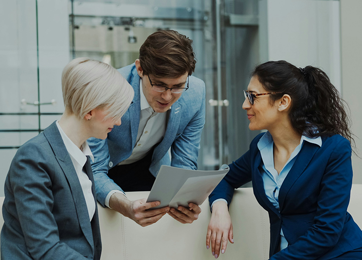 Three people having a conversation