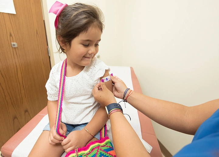 Child receiving vaccine