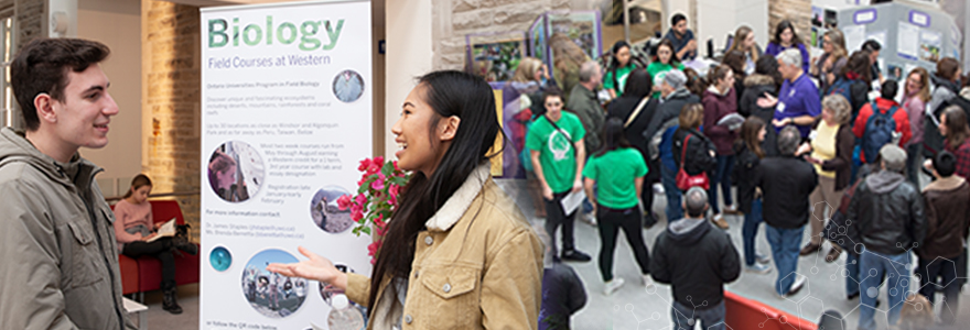 Biology student talking to prospective student about field courses; Physics and Astronomy Building Atrium filled with people at Fall Preview Day