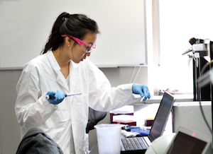 Female student working in immunology lab