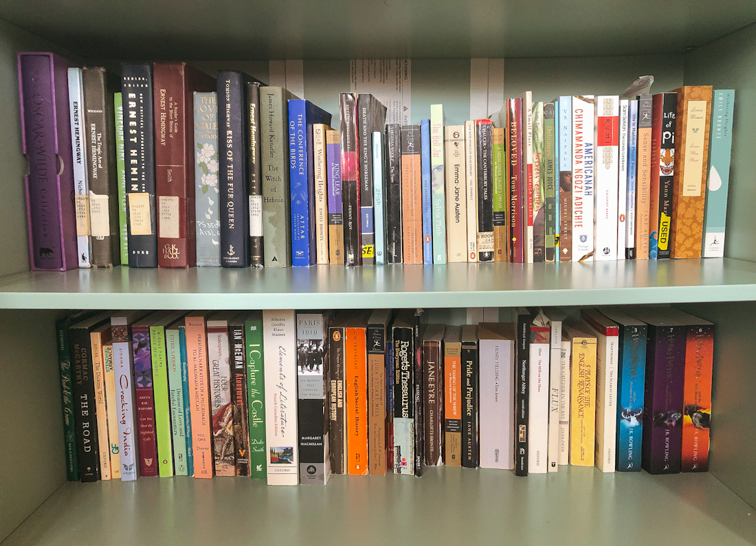 A stack of books on a shelf