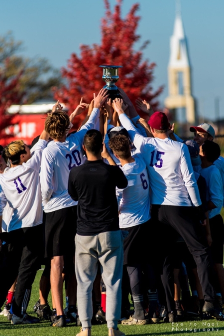 Evan and the ultimate team holding up their trophy in celebration. Photo by Eye to Ngai Photography